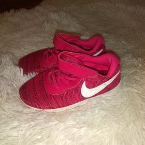 Like new girls Nike sneakers.